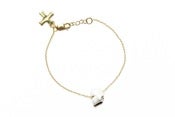 Image of HUGO SKULL BRACELET - WHITE (SILVER/GOLD)