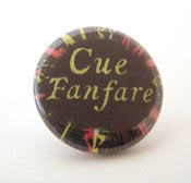 Image of Cue Fanfare badge