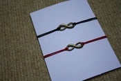 Image of 'Infinite Love' Bracelet on Waxed Cotton