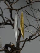 Image of silver and gold leaf blade earrings