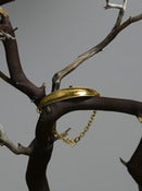 Image of silver and gold leaf blade bracelet