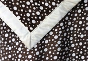Image of Brown & White Dot