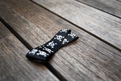 Image of Skull And Crossbones Hair Bow