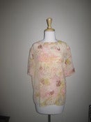 Image of neutral floral blouse
