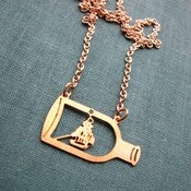 Image of ship in a bottle necklace - vintage brass