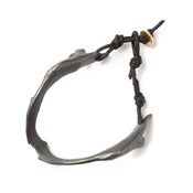 Image of oxidized silver fish jaw cuff w/ black wax-coated cotton cord & brass button closure (B08sil)
