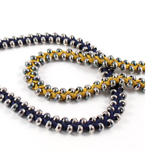 Image of long beaded plait necklace- mustard