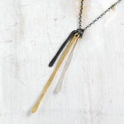 Image of sliver mixed metal trio necklace