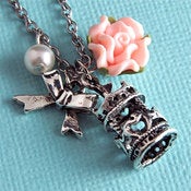 Image of Merry Go Round - Silver and Peach Carousel Necklace with Bow and Pearl