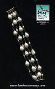 Image of SIGNATURE - Four row hand-link bracelet