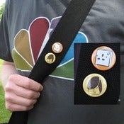 Image of 'Emo' and 'Plug Socket' badge set
