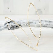 Image of duality gold and silver crescent earring s/m/l