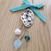 Image of leaf from a cherry blossom tree necklace