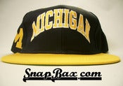 Image of VINTAGE UNIVERSITY OF MICHIGAN WOLVERINES LOGO 7 SNAPBACK CAP