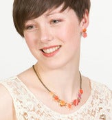 Image of Secret Garden Necklace (on cream acrylic with antique gold chain)