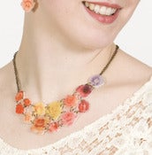 Image of Petal Spectrum Necklace (on cream acrylic with antique gold chain)