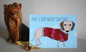 Image of Christmas Card with sausage dog illustration