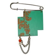 Image of Green baroque kilt pin brooch