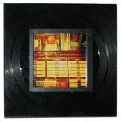 Image of Square frame made with a recycled vinyl record.