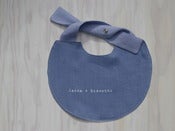Image of bib " latte + biscotti" blue