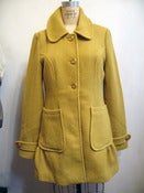Image of gold color fall coat