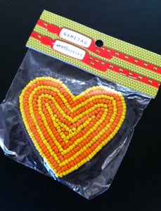Image of hand beaded heart magnet