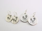 Image of flower stamped earrings