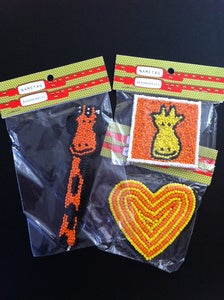 Image of set of 3 hand beaded magnets
