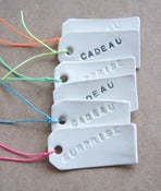 Image of Etiquettes porcelaine "Surprise"
