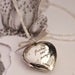 Image of heart locket with hand engraving