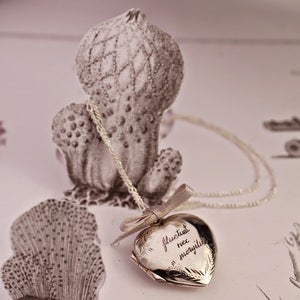Image of heart locket with hand engraving