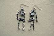 Image of skeleton earrings.