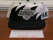 Image of VINTAGE DEADSTOCK LA LOS ANGELES KINGS "SHARKTOOTH / WAVE" LOGO ATHLETIC SNAPBACK CAP HAT
