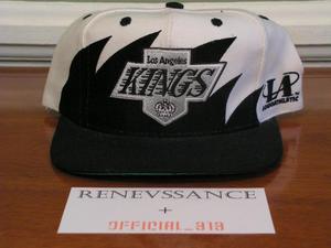 Image of VINTAGE DEADSTOCK LA LOS ANGELES KINGS "SHARKTOOTH / WAVE" LOGO ATHLETIC SNAPBACK CAP HAT