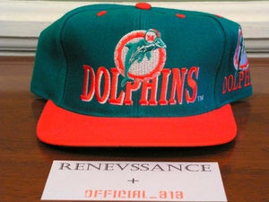Image of VINTAGE DEADSTOCK MIAMI DOLPHINS AJD "LOGO / ALL OVER TEXT" SNAPBACK CAP HAT