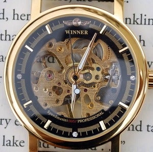 Image of Black and Gold Mechanical Wind-Up Wrist Watch