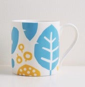 Image of Bone china yellow/blue leaf mug