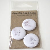 Image of cats commissioned artist button set by sarah mcneil.