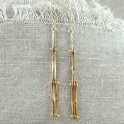 Image of vermeil bone earrings