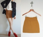 Image of fitting mustard mini skirt S