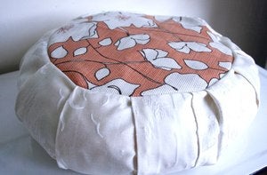 Image of Eco Friendly Meditation Pillow, cream and orange floral. 
