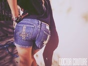Image of "WILD SIDE" STUDDED CROSS SHORTS