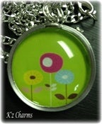 Image of Round Green and Floral Charm