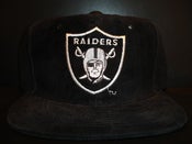 Image of Vintage Los Angeles Raiders leather snapback hat by Universal.