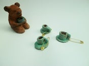 Image of ceramic tea cup brooch 
