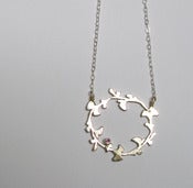 Image of circular gingko necklace with birthstone