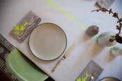 Image of Nearly White linen tablecloth with Citron yellow arrows