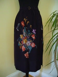 Image of dark purple floral print skirt