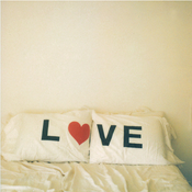 Image of love up on those pillows