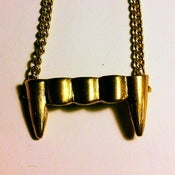 Image of Brass Fangs